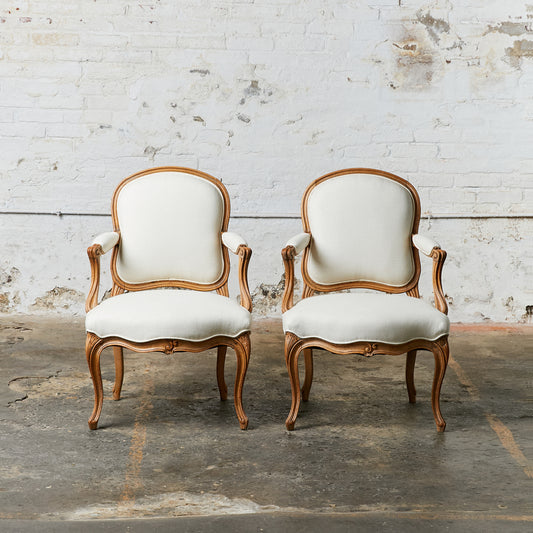 A Pair of Louis XV Style Arm Chairs