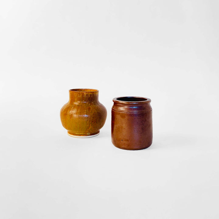 Wallåkra Dark Brown Vase, Made in Sweden. Paired with a California Pottery Vase in Light Brown.