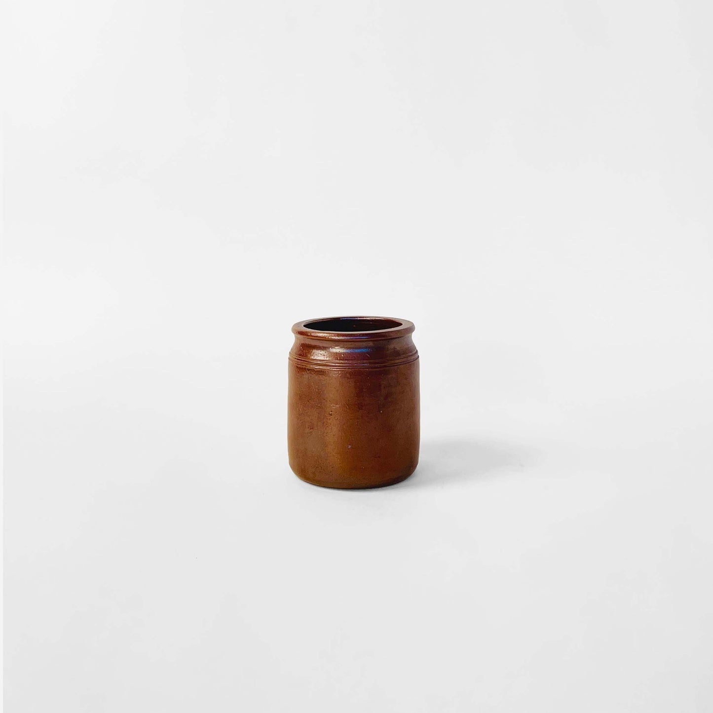 Wallåkra Dark Brown Vase, Made in Sweden. Paired with a California Pottery Vase in Light Brown.