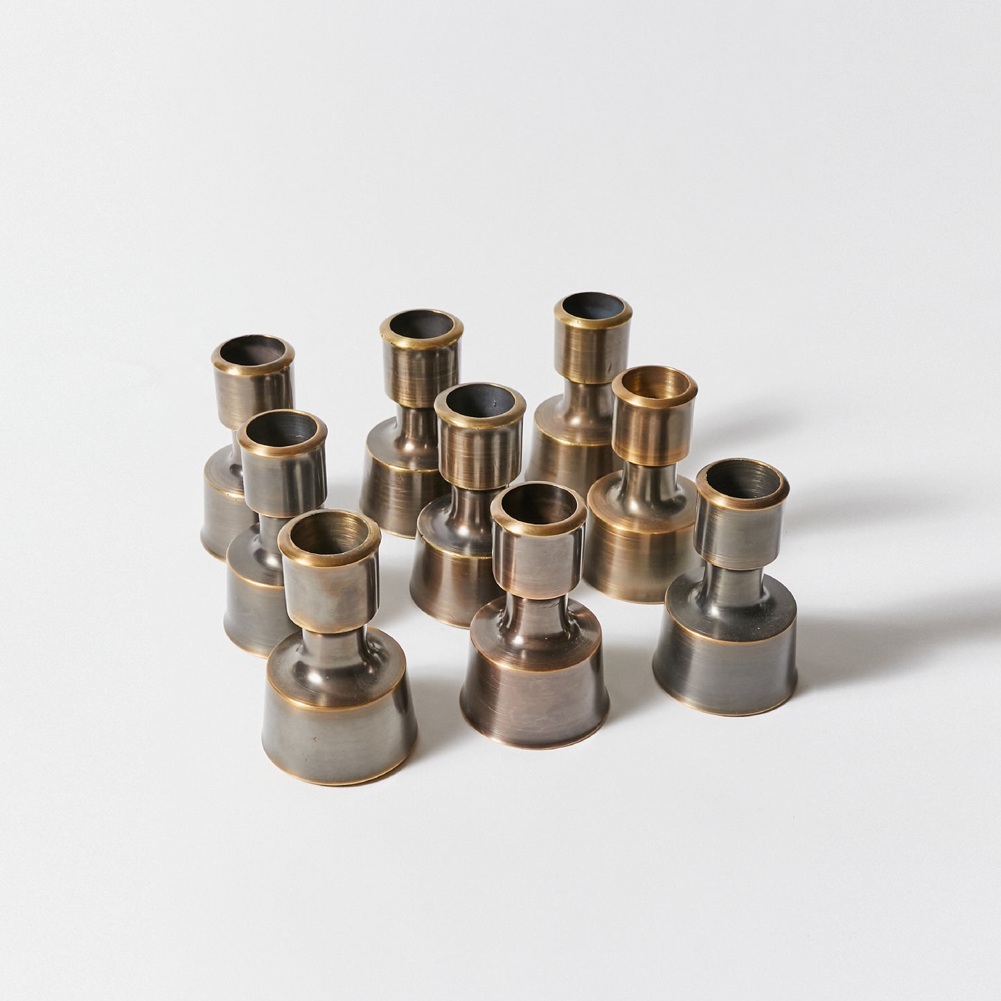 Set of Ten Candle Holders by Jens H. Quistgaard for Dansk Designs