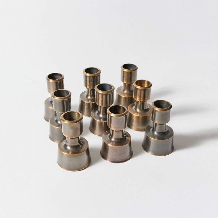 Set of Ten Candle Holders by Jens H. Quistgaard for Dansk Designs