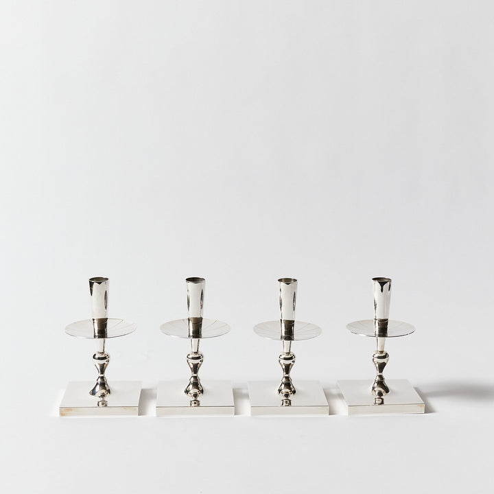 Set of Four Candle Sticks by Tommi Parzinger for Dorlyn Silversmiths