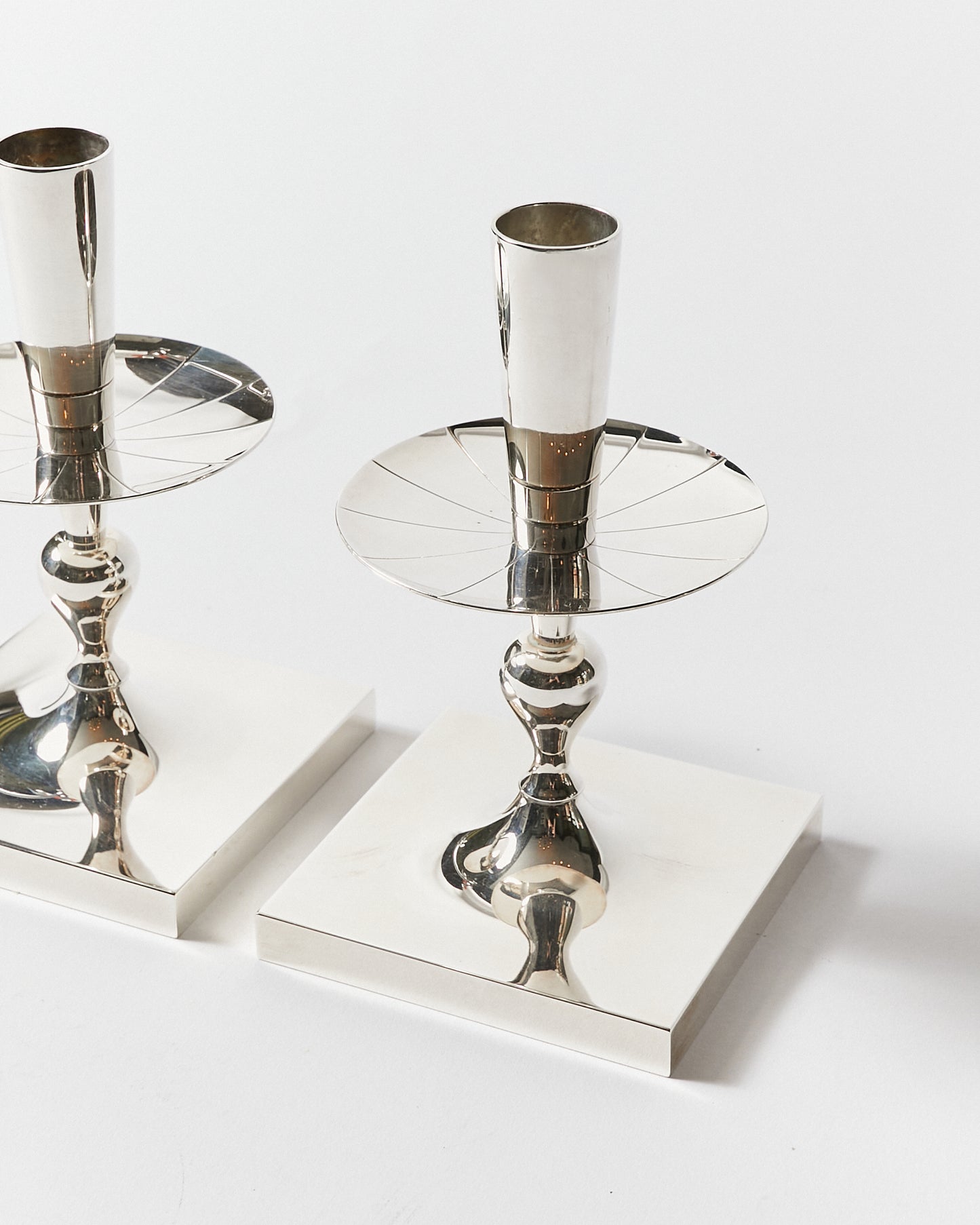 Set of Four Candle Sticks by Tommi Parzinger for Dorlyn Silversmiths