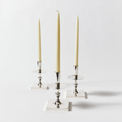 Set of Four Candle Sticks by Tommi Parzinger for Dorlyn Silversmiths