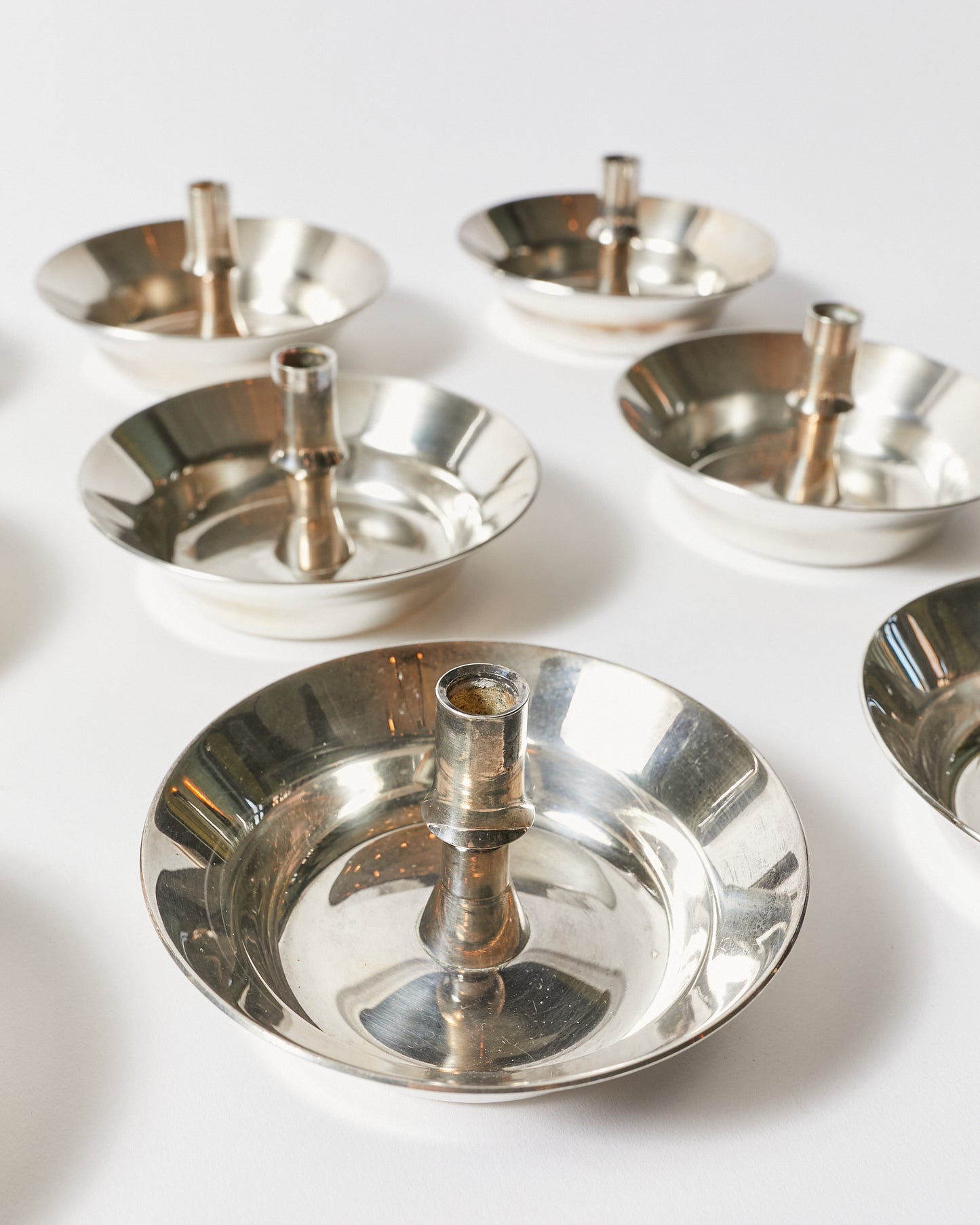 Set of Nine Candle Holders by Jens H. Quistgaard for Dansk Design