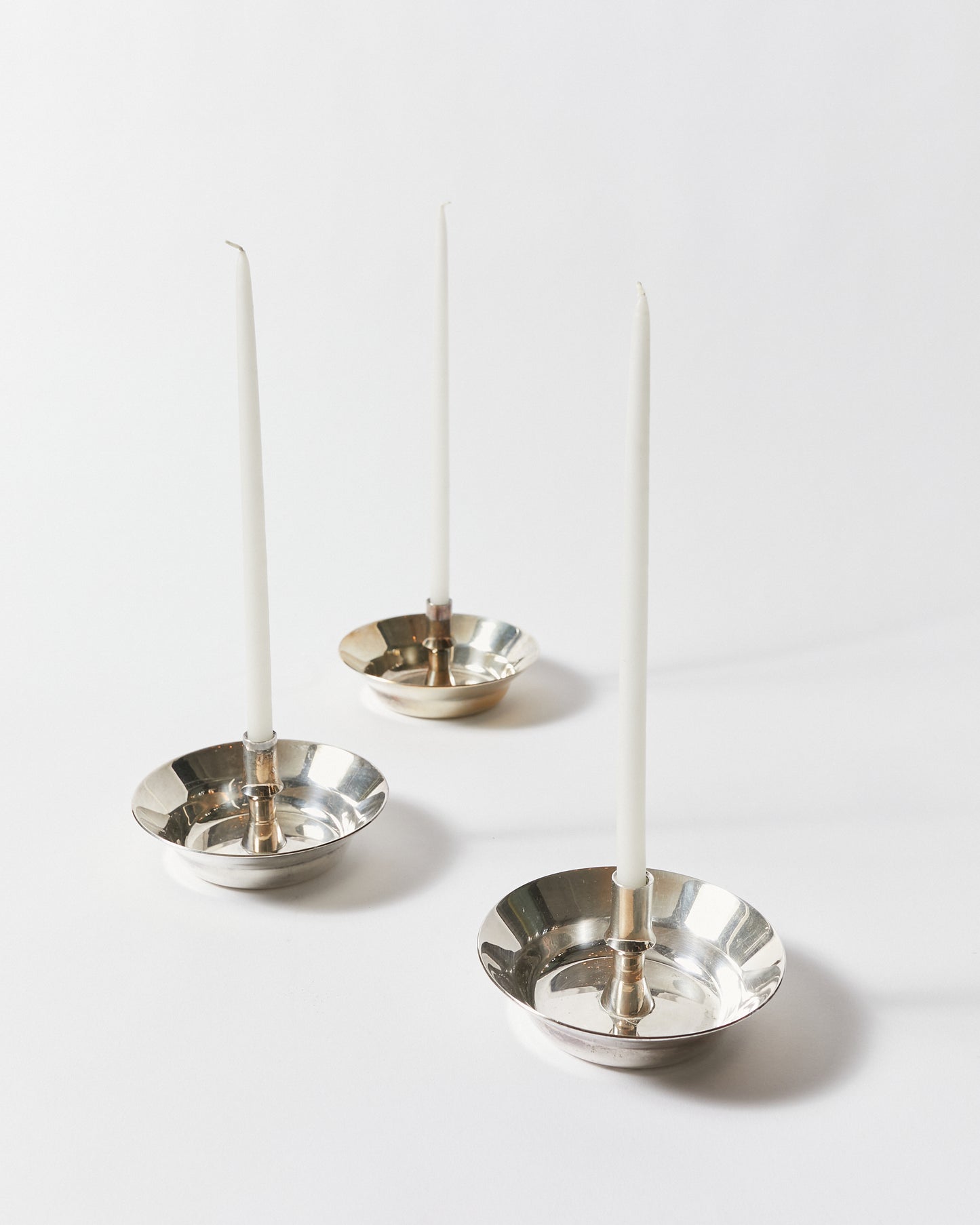 Set of Nine Candle Holders by Jens H. Quistgaard for Dansk Design