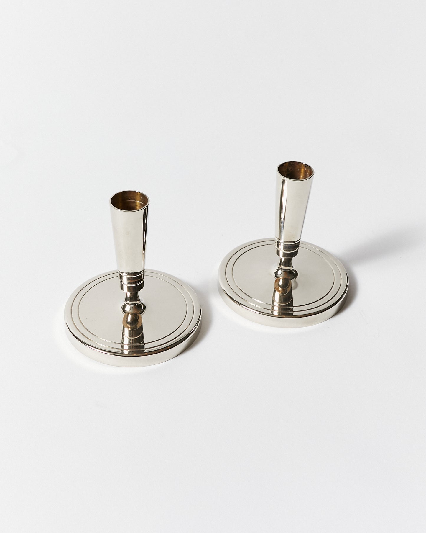 Pair of Candlesticks by Tommi Parzinger for Dorlyn Silversmiths