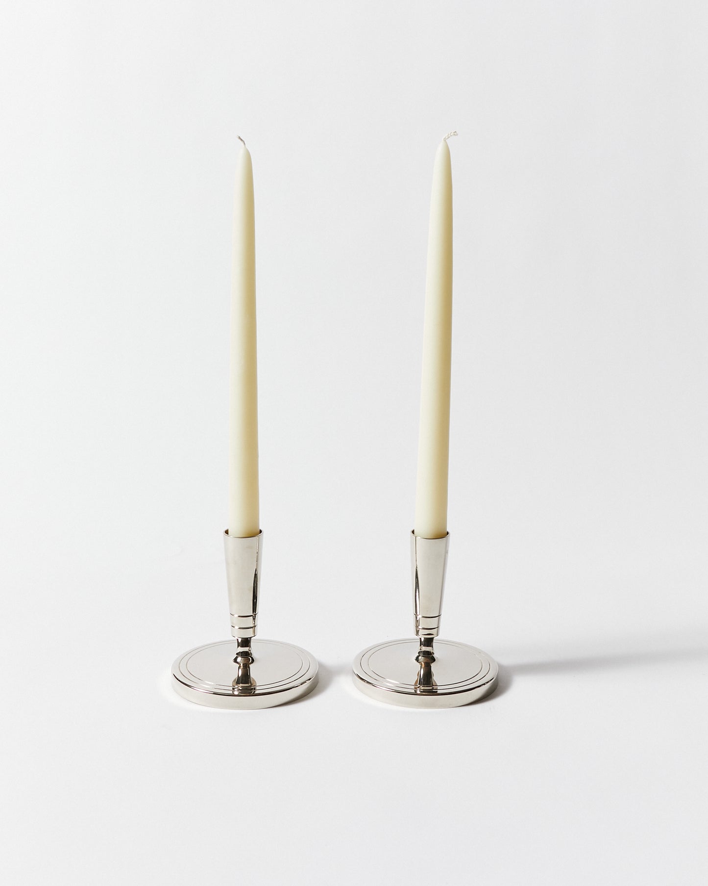 Pair of Candlesticks by Tommi Parzinger for Dorlyn Silversmiths