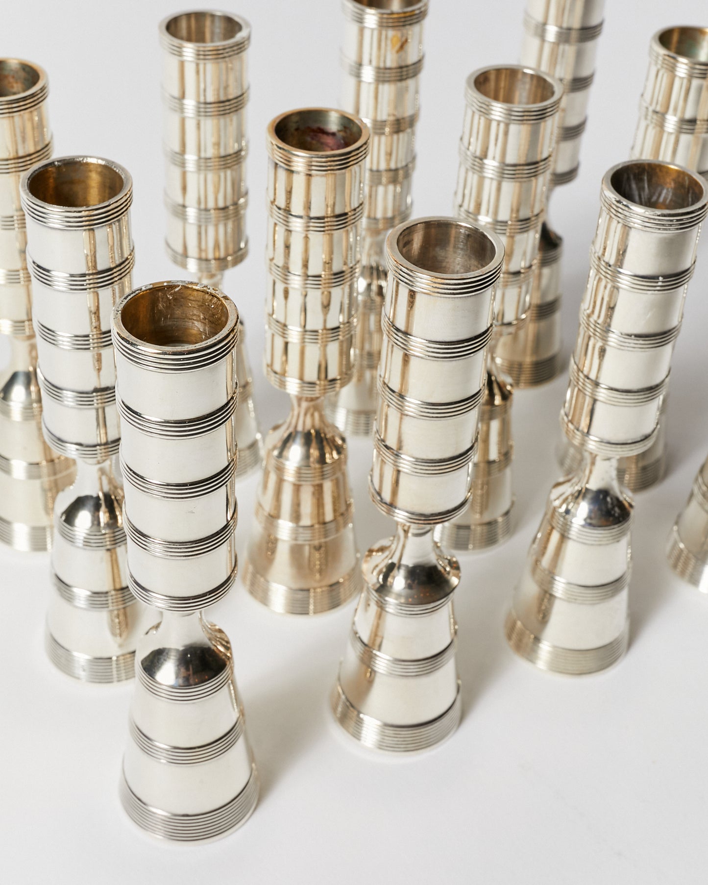 Set of Thirty Eight Silver Plated Pilar Candlesticks by Dansk