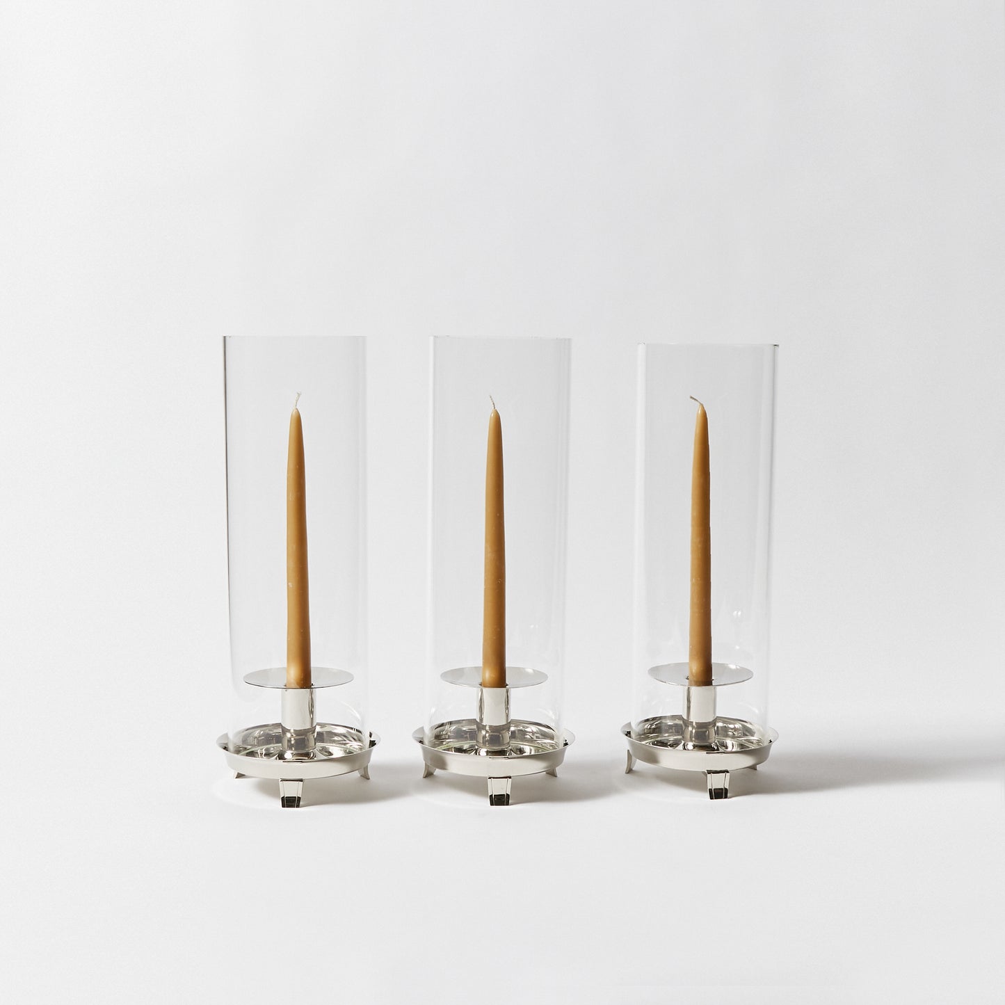 Set of Three Stylized Tiered Candle Holders by Tommi Parzinger for Dorlyn-Silversmiths