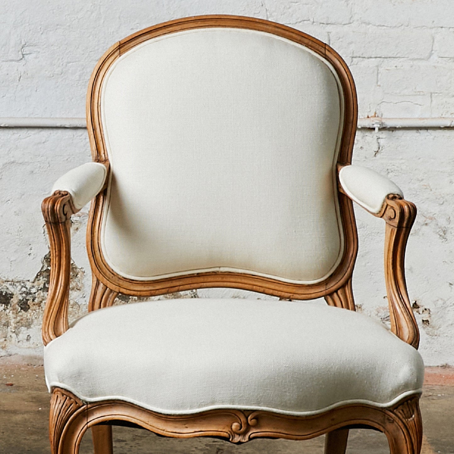 A Pair of Louis XV Style Arm Chairs