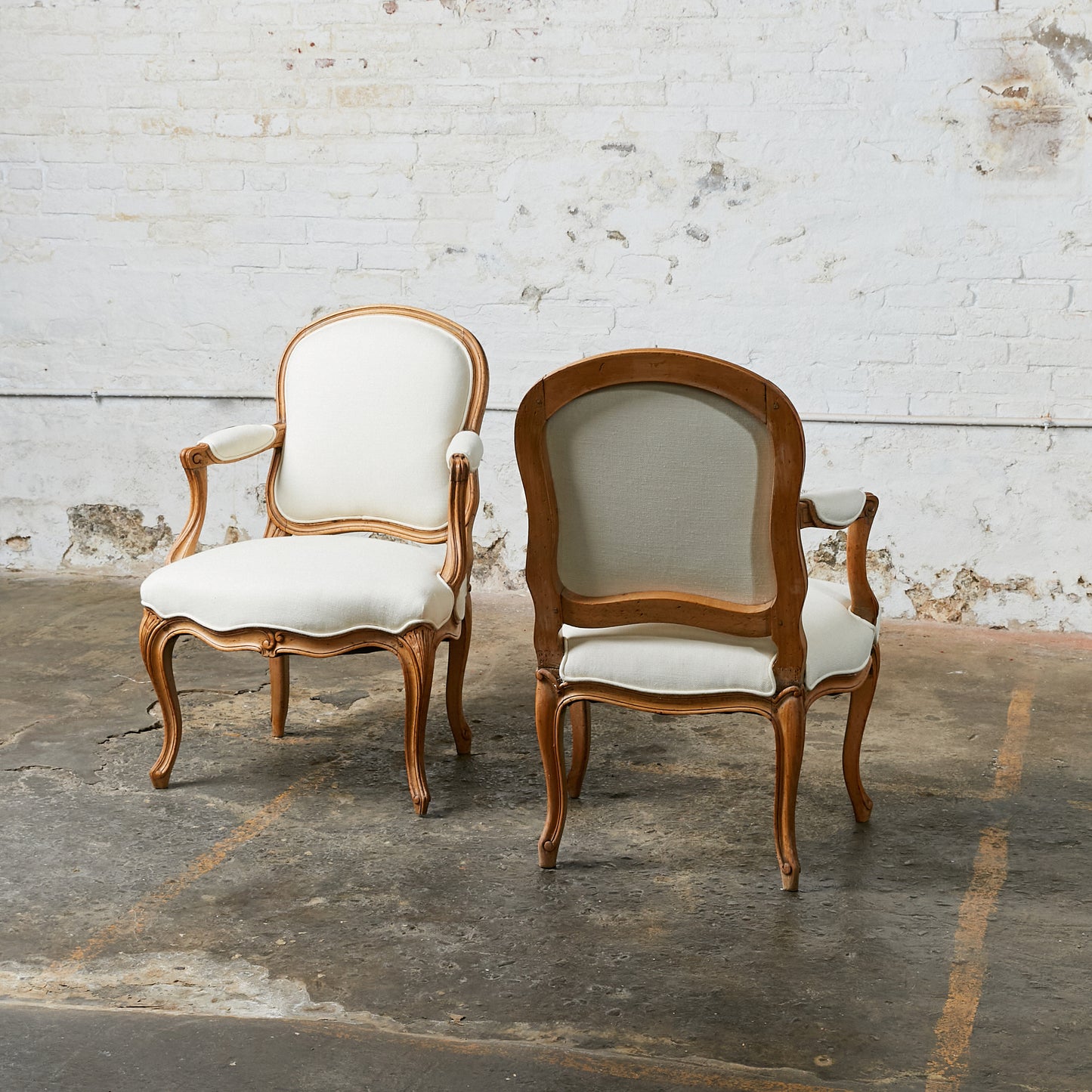 A Pair of Louis XV Style Arm Chairs