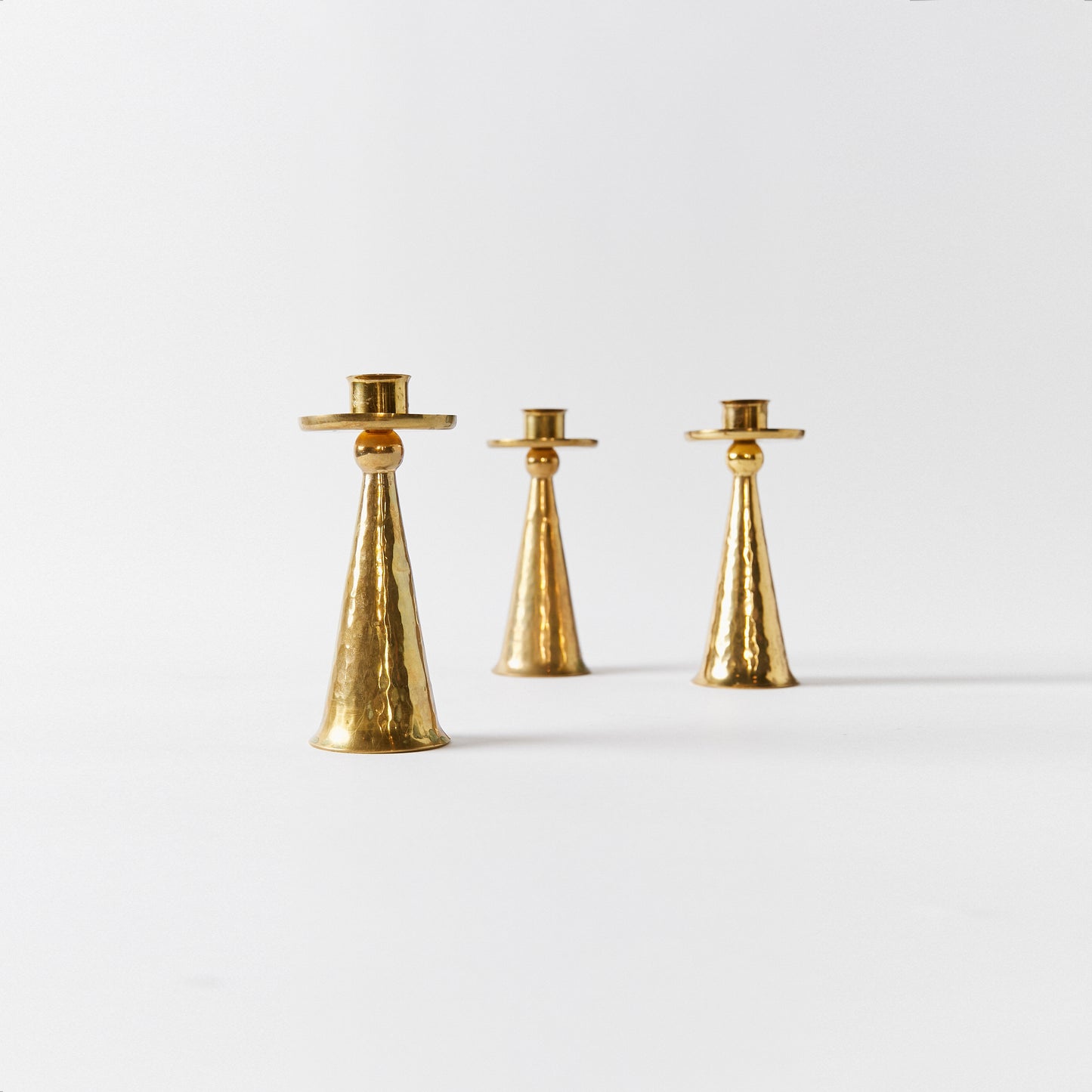 Set of Three Petite Candlesticks in Bronze